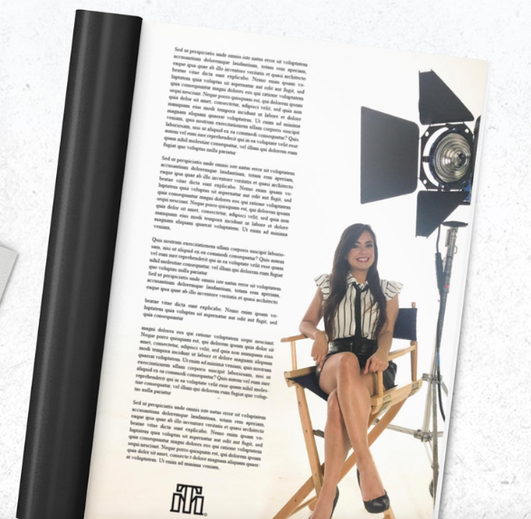 Editorial spread of Andrea Ocampo seated in a director's chair